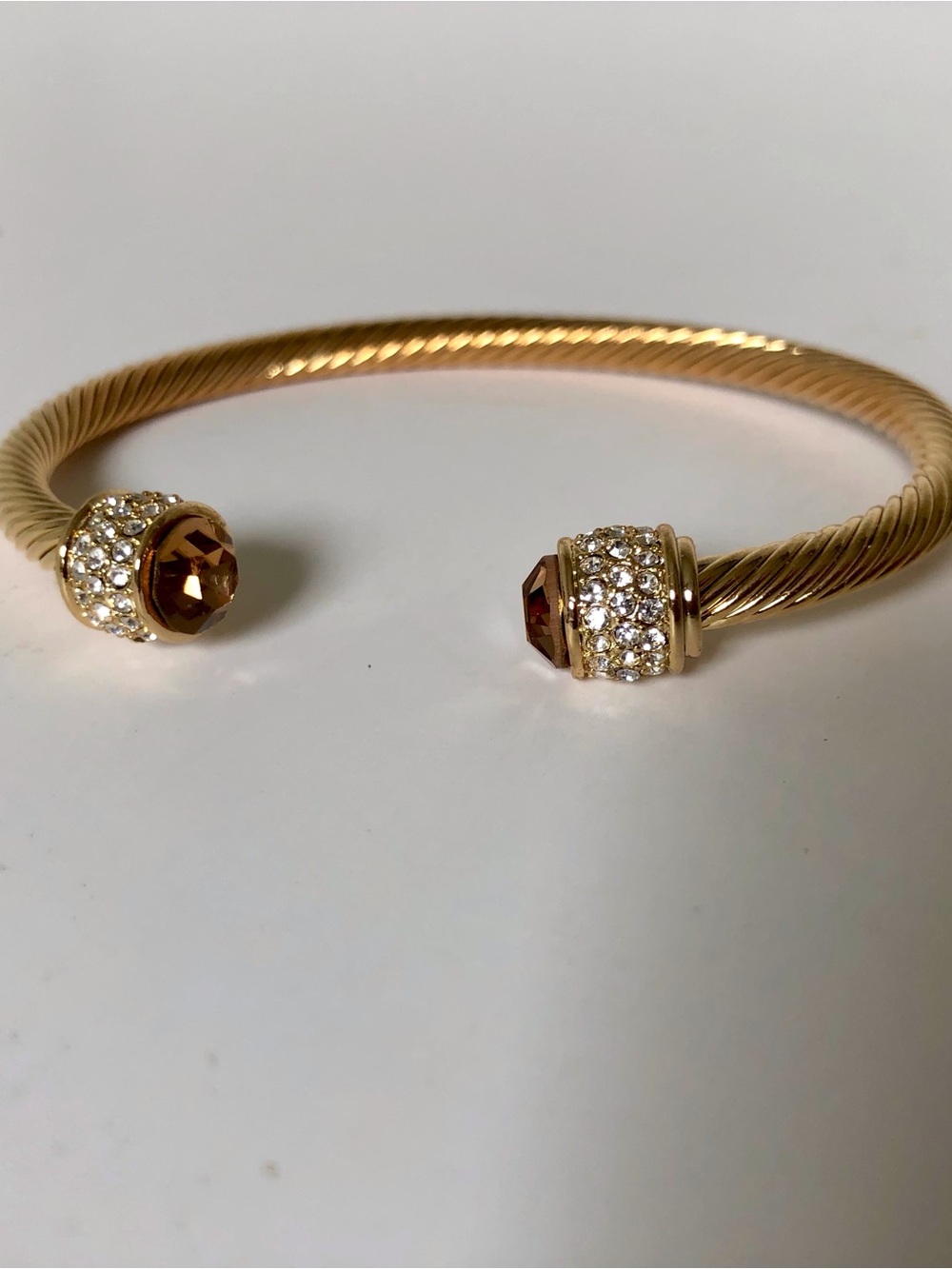 Gold-Tone Open Cable Cuff Bracelet with Brown Crystal Ends